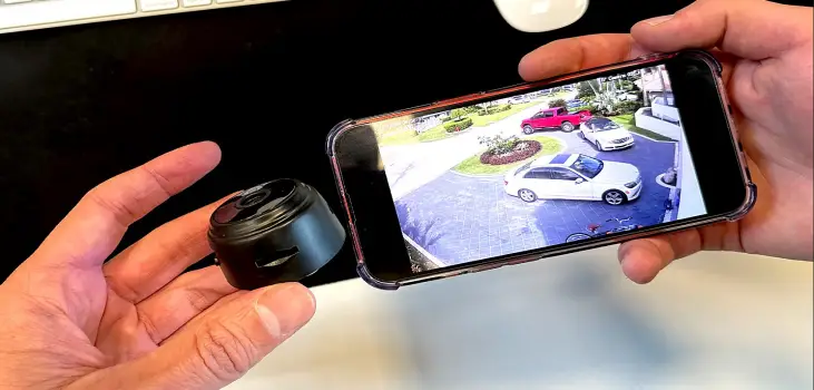 PixieLens Pro next to phone displaying camera feed